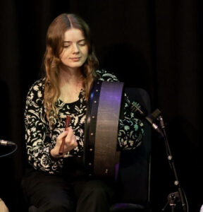 holly playing the bodhrán